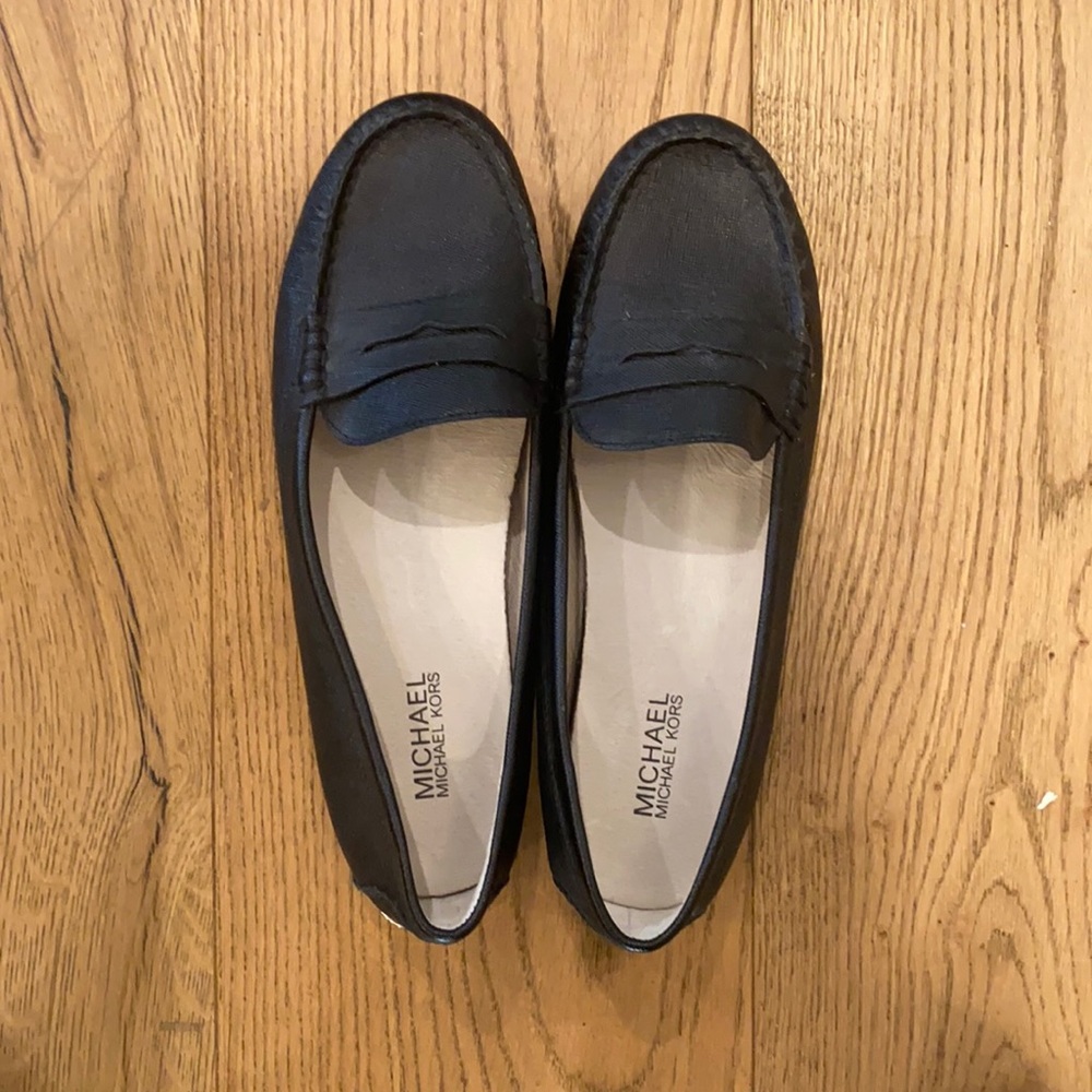 Michael Kors, flat black shoe.
